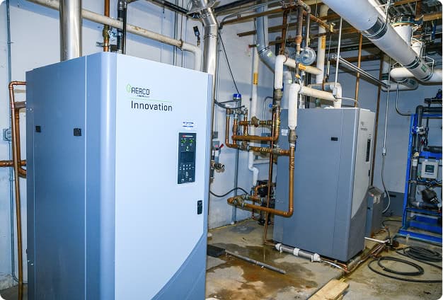 Industrial HVAC equipment installation by OnPoint Mechanical for optimal climate control.